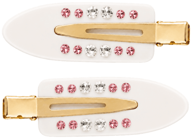 A pair of white Confetti pintail clips with gold hardware and rows of pink and clear stones.